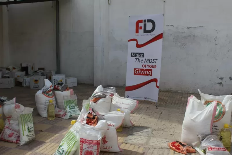 منظمة FID وبالتعاون مع الجامعة الإماراتية الدولية بصنعاء توزع أكثر من 700 سلة غذائية على الأسر المحتاجة