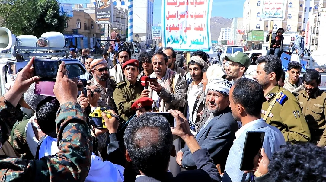 Emirates International University staff participate in the popular march of the General Mobilization Forces
