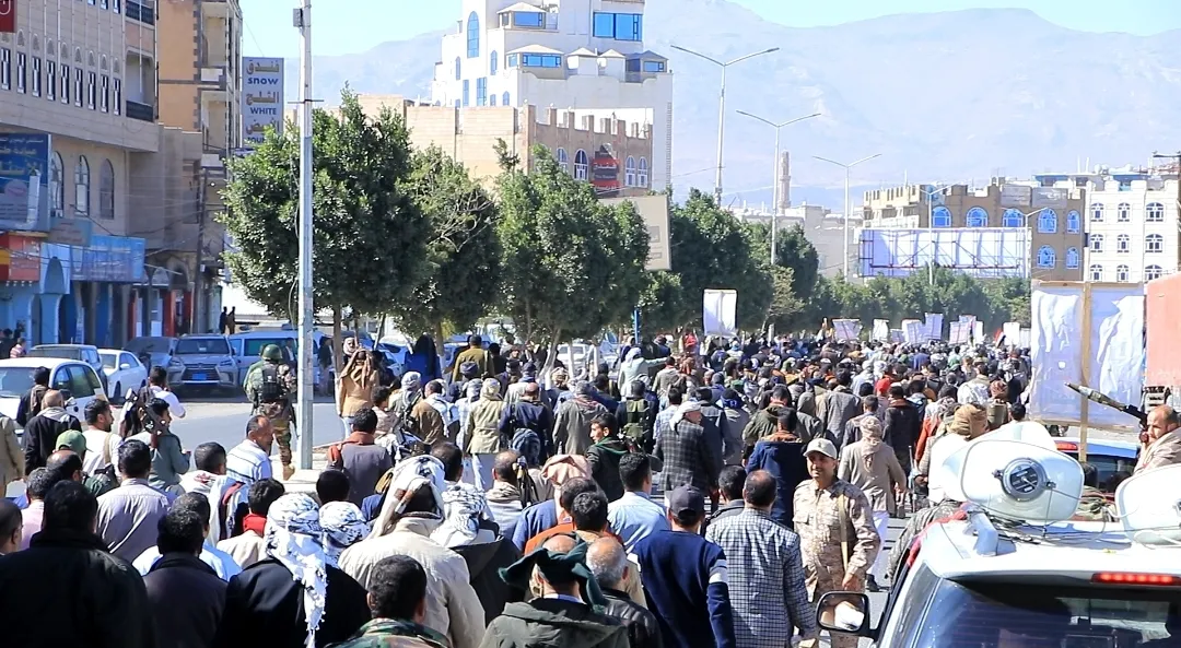 Emirates International University staff participate in the popular march of the General Mobilization Forces