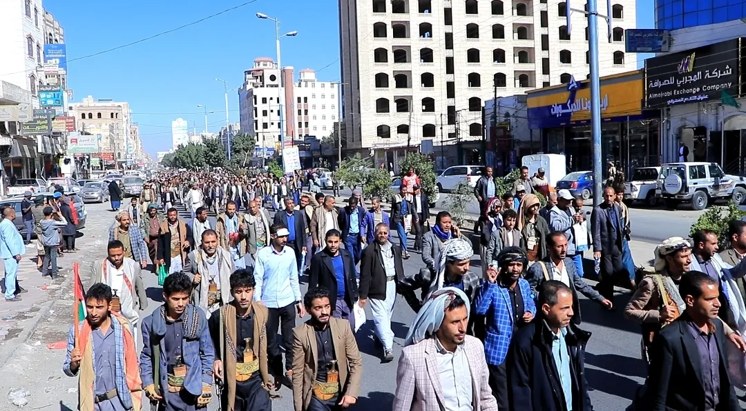 Emirates International University staff participate in the popular march of the General Mobilization Forces