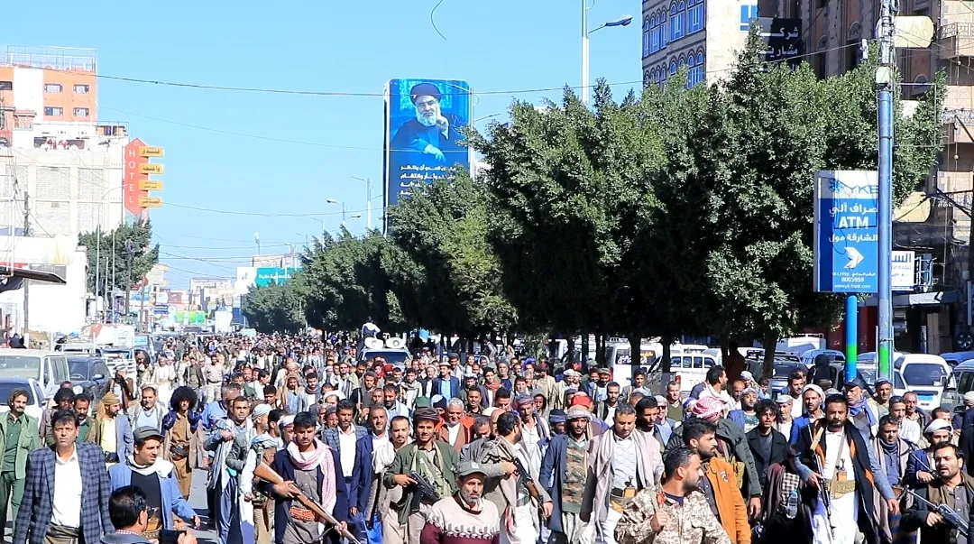 Emirates International University staff participate in the popular march of the General Mobilization Forces