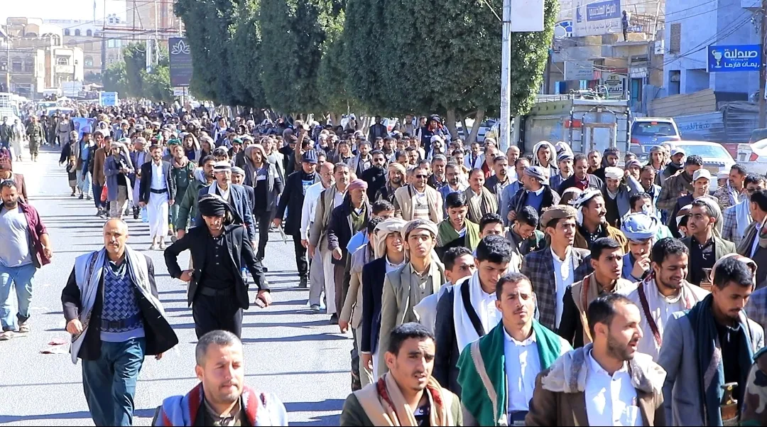 Emirates International University staff participate in the popular march of the General Mobilization Forces