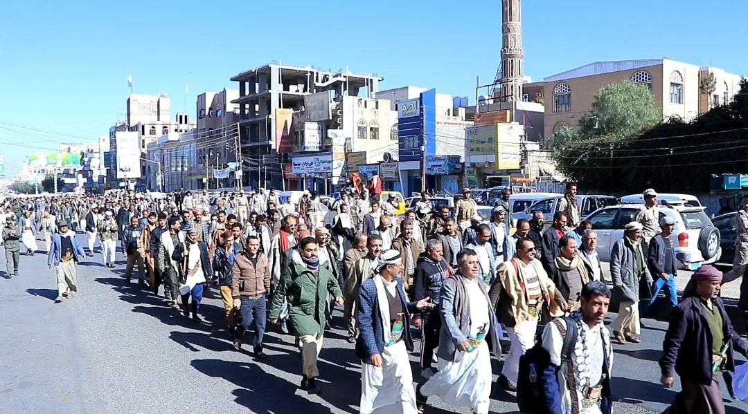 Emirates International University staff participate in the popular march of the General Mobilization Forces