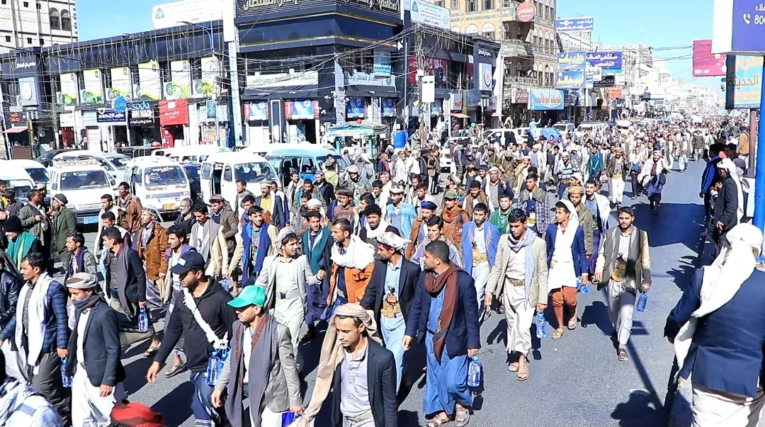 Emirates International University staff participate in the popular march of the General Mobilization Forces