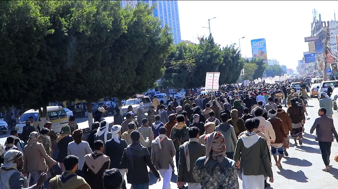 Emirates International University staff participate in the popular march of the General Mobilization Forces