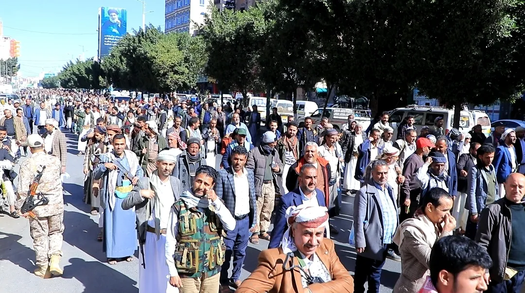 Emirates International University staff participate in the popular march of the General Mobilization Forces