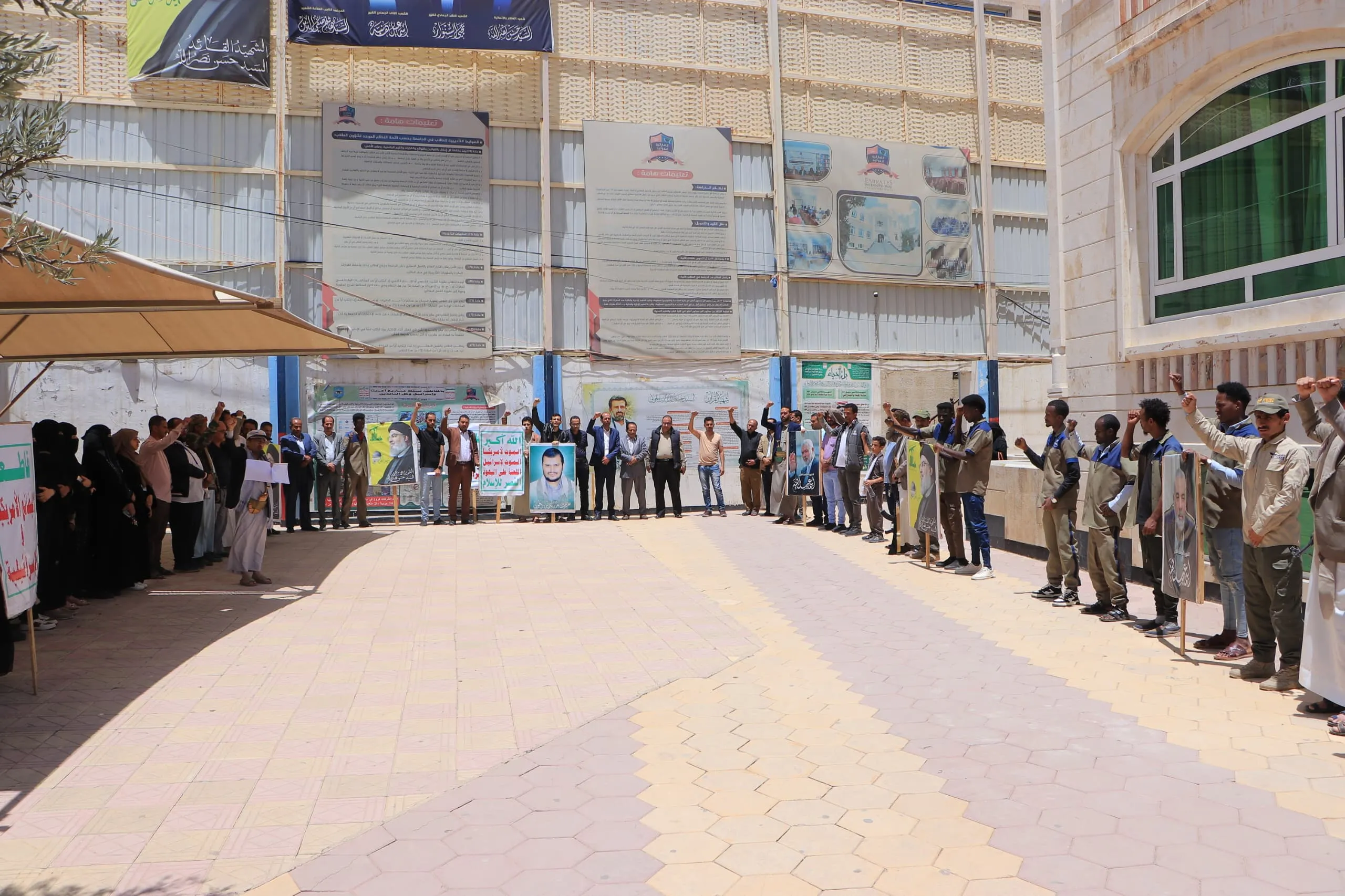 The Emirates International University organizes a solidarity stand with the Palestinian people under the slogan "With Gaza to confront genocide and starvation."
