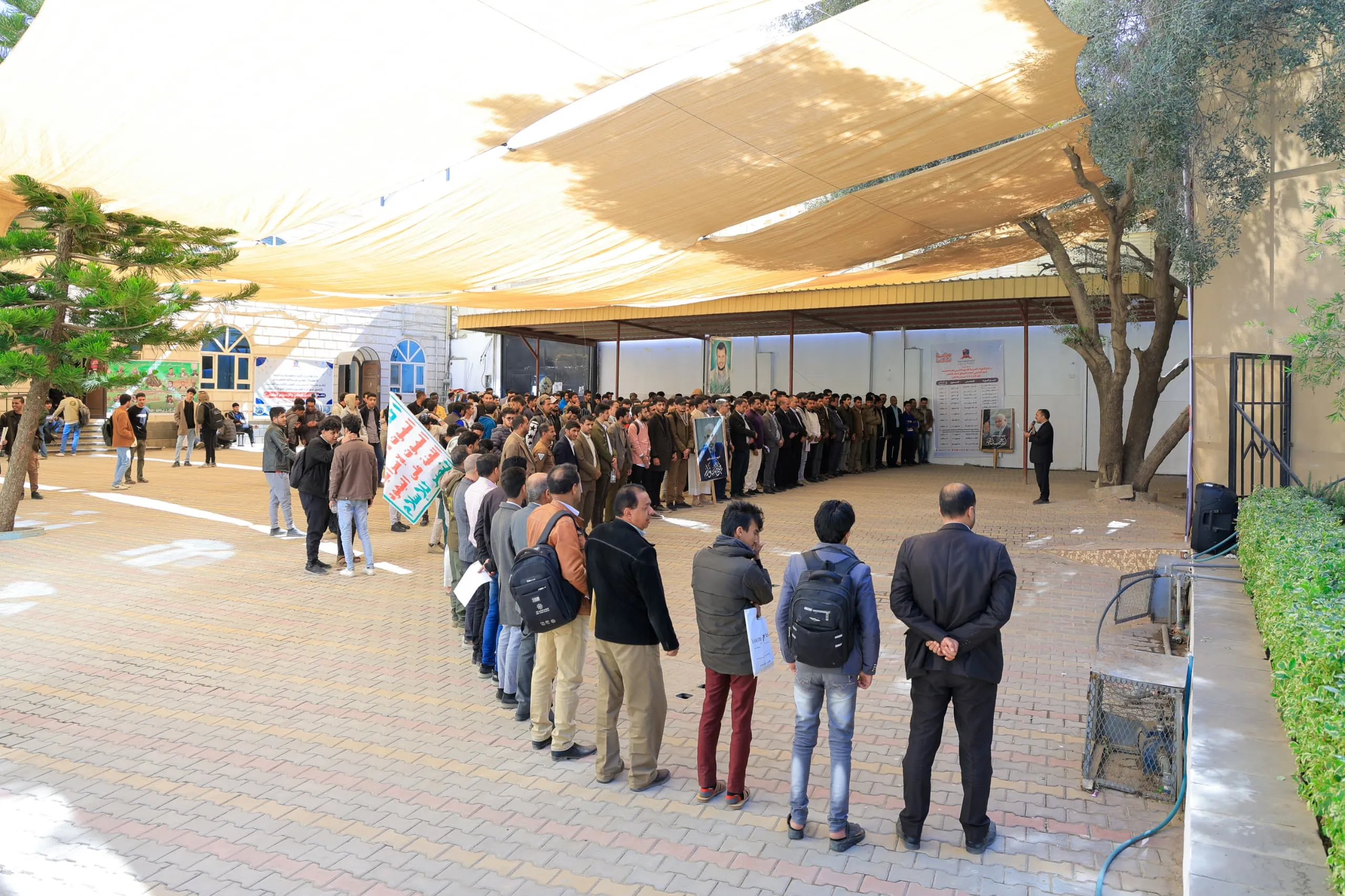 A massive rally by members of the Emirates International University under the slogan “Indeed, your Lord is ever watchful.”