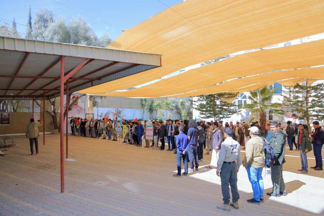 Members of the UAE University organize the weekly vigil entitled “A pledge to the martyr of the Quran: Our mobilization continues and our readiness is high.”