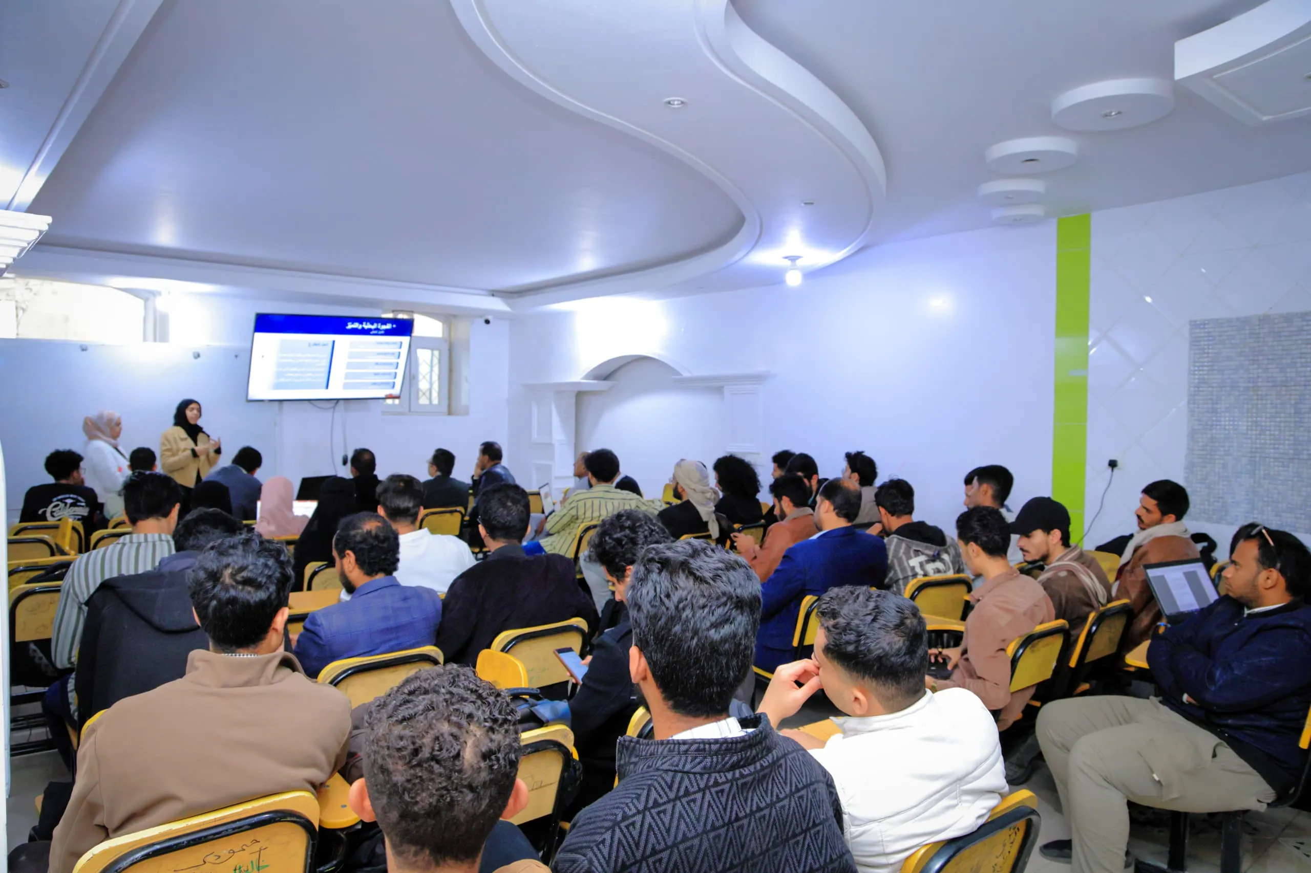 Smart projects are shaping the future... Artificial intelligence students at the Emirates International University discuss groundbreaking scientific innovations.