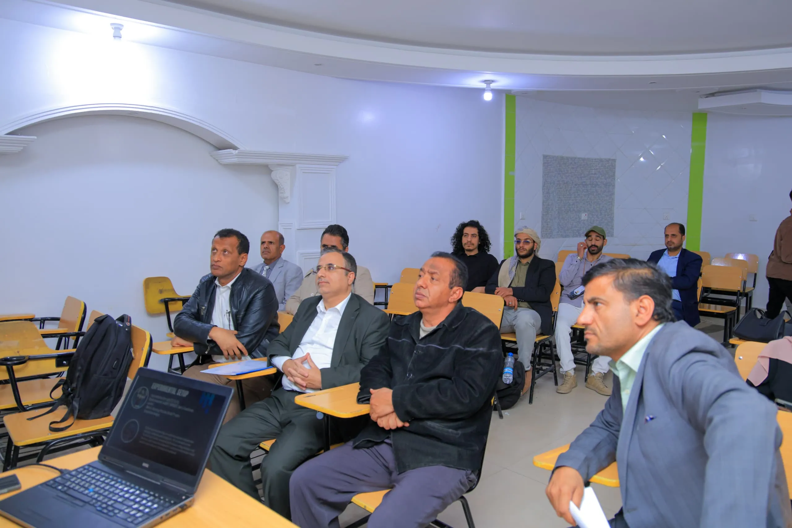 Smart projects are shaping the future... Artificial intelligence students at the Emirates International University discuss groundbreaking scientific innovations.